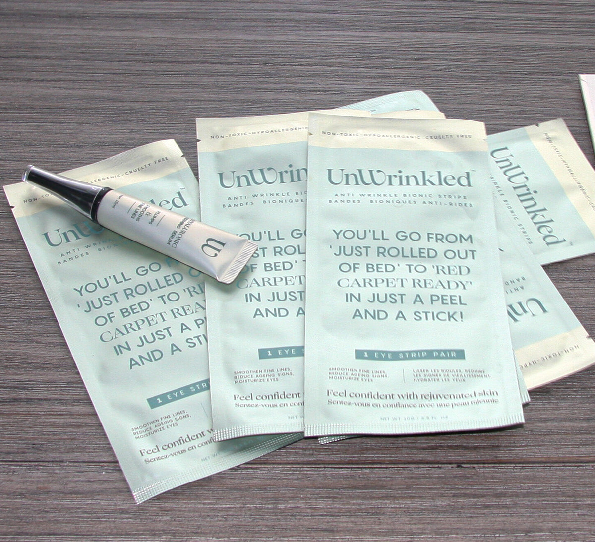 Eye strip sachets fanned out with the firming serum
