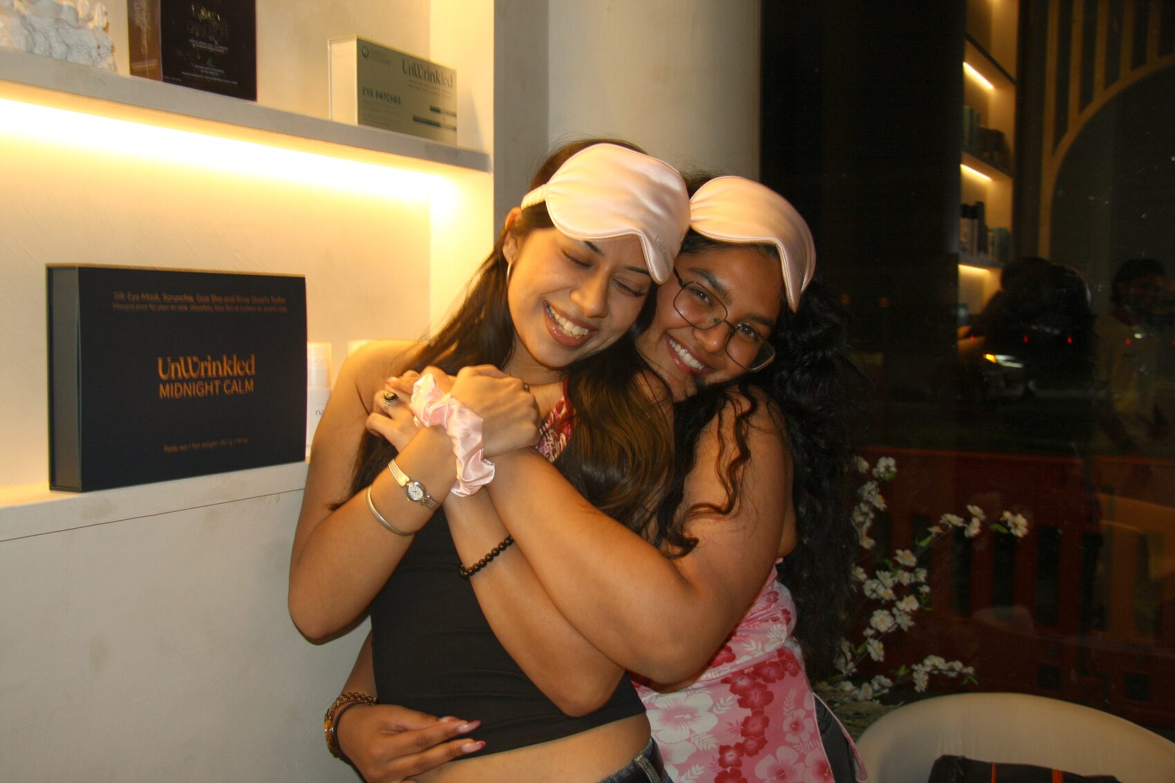 Two friends in silk eye masks